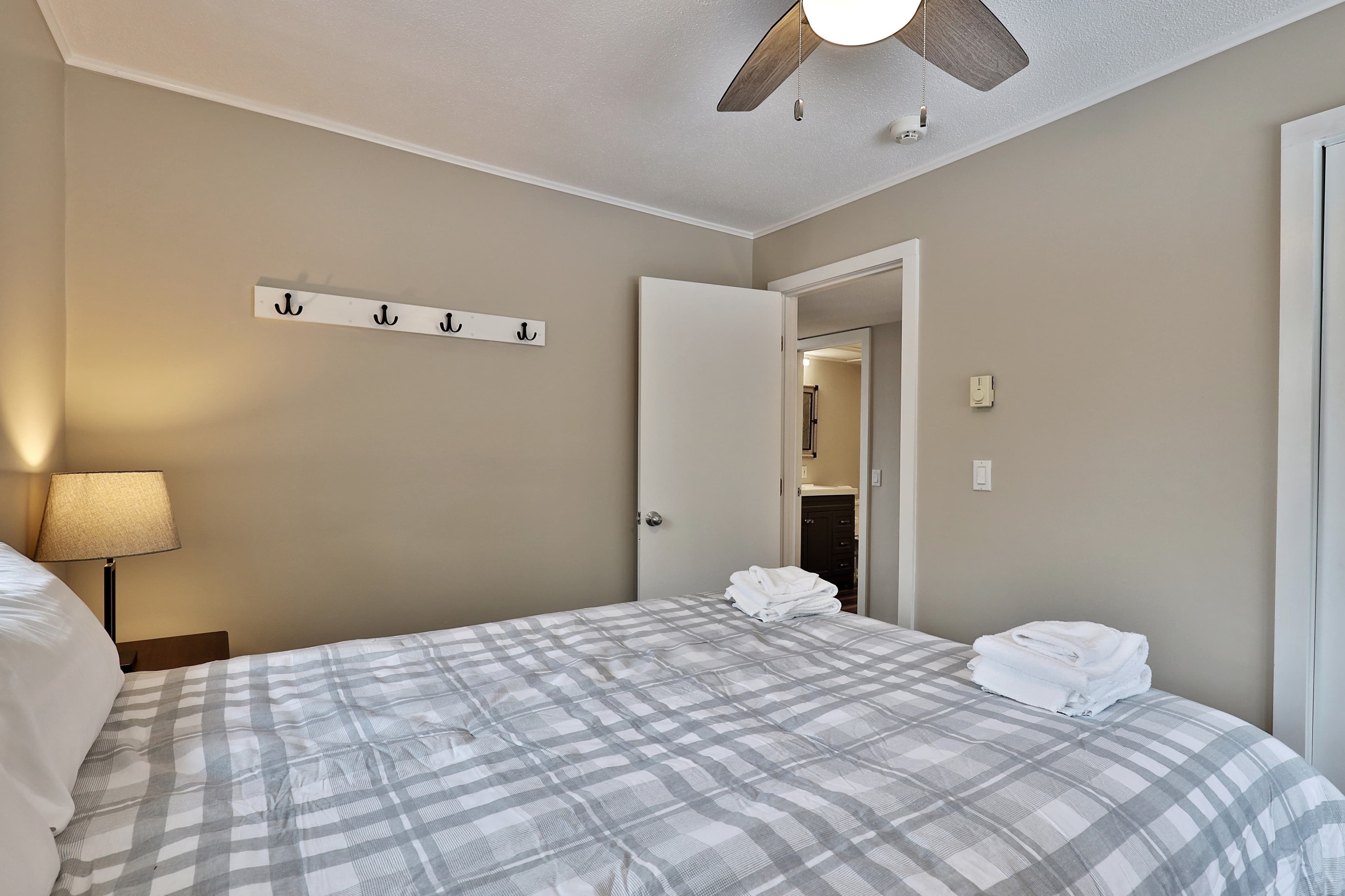 Queen bed with Sealy Posturepedic mattress! Natural lighting to warmly wake you in the morning.
