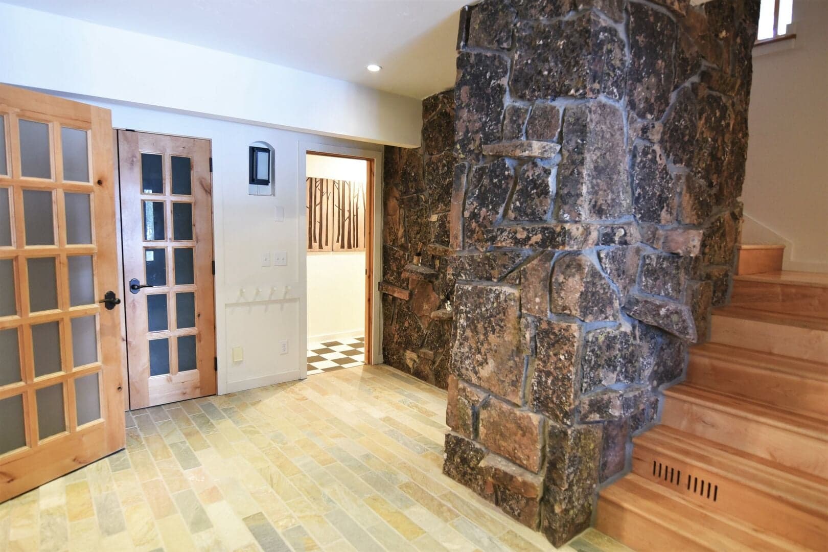 Foyer with access to Spa Area to the left, Laundry and Queen Bedroom Hall
