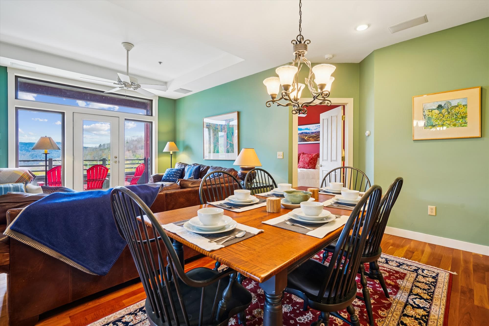 The dining area sits at the heart of the home, bridging the kitchen and living room with easy flow and beautiful natural light.