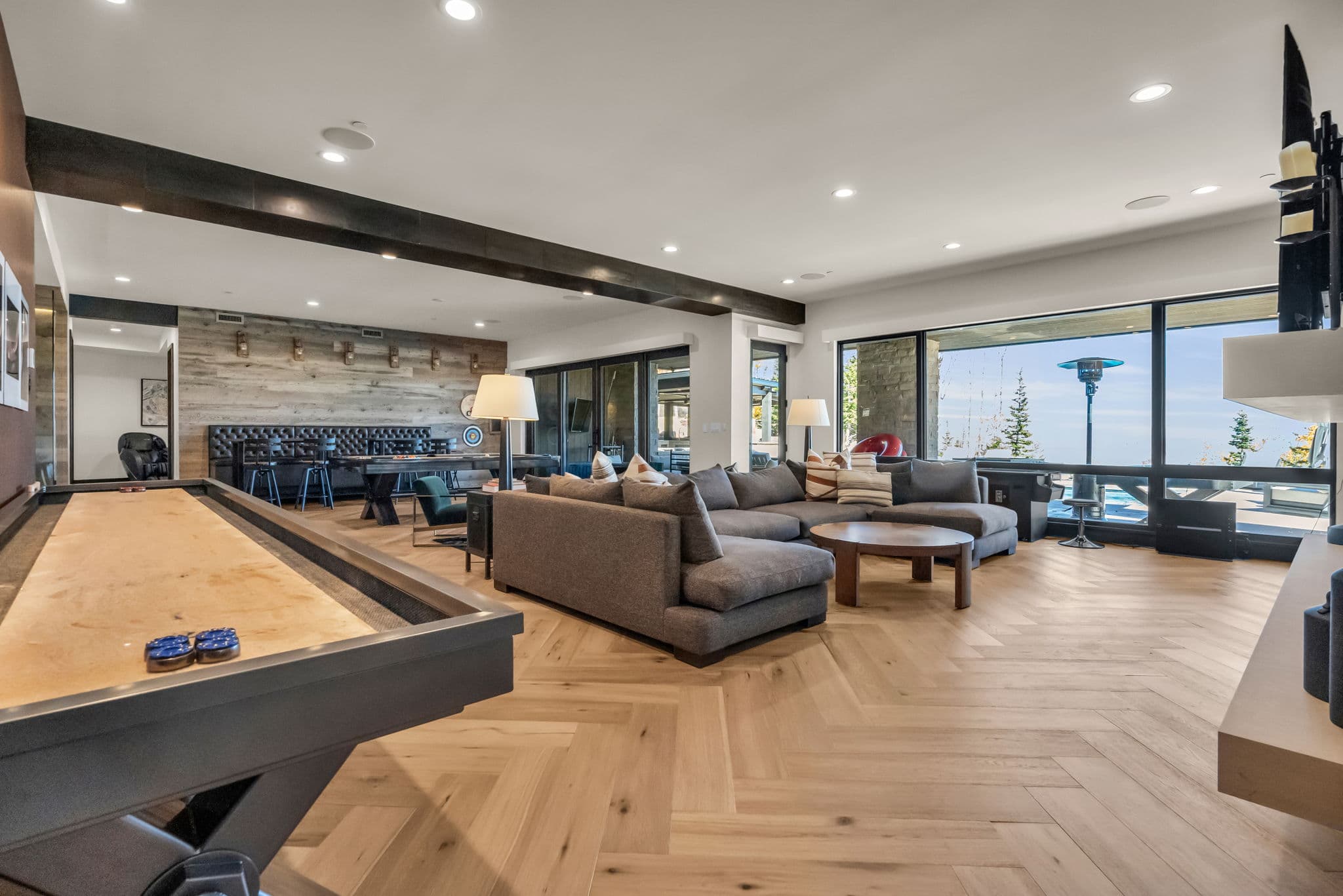 Game Room with Sectional Sofa, Pool Table, and TV