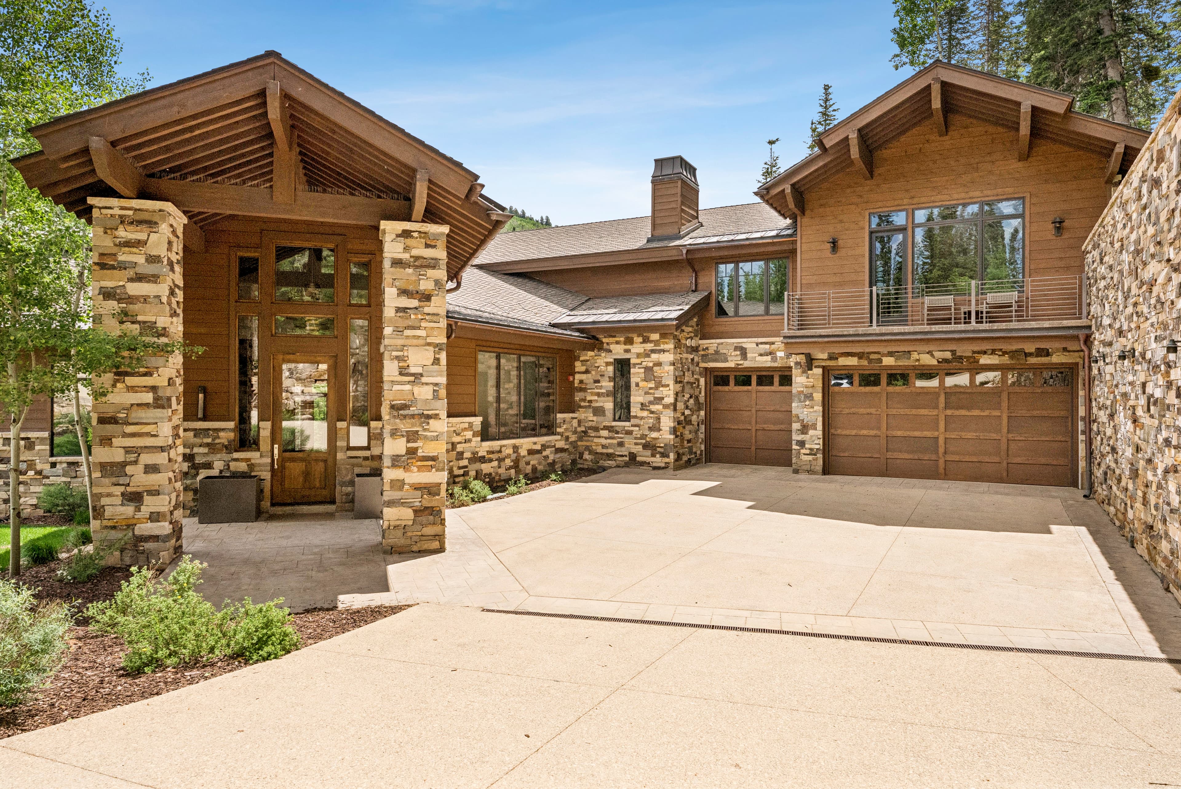 the front entrance of grandview with stonework and large windows
